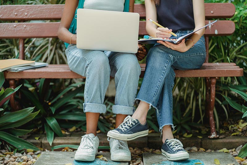 students with laptop