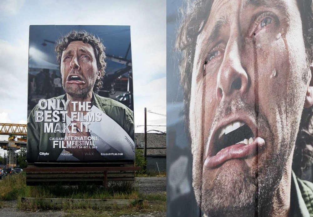 man crying billboard advertising