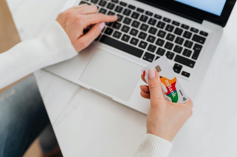 person holding a credit card