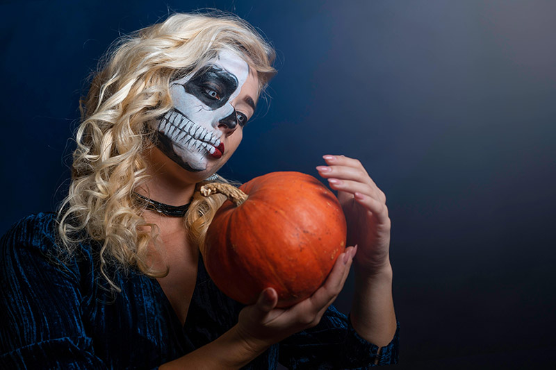 woman with pumpkin