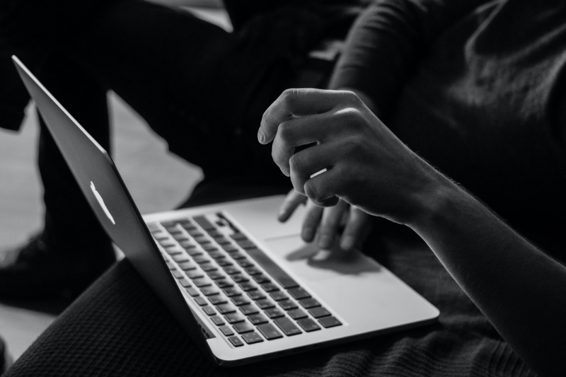 Using laptop stock image