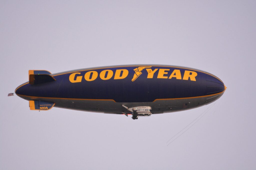 A blimp with a logo

aerial advertisement