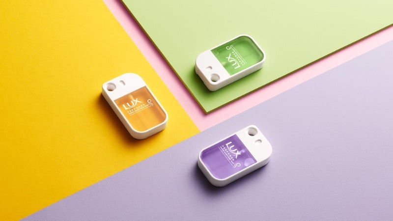 Purple, yellow, and green hand sanitizer bottle designs by CRX