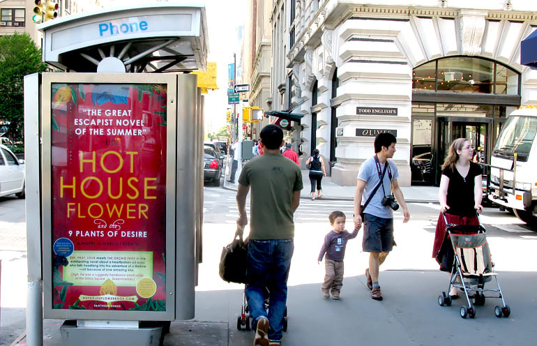 Street furniture outdoor advertising at a payphone