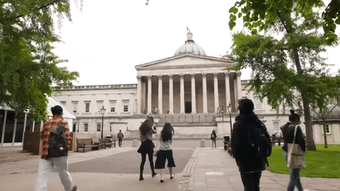 Students walking towards university building